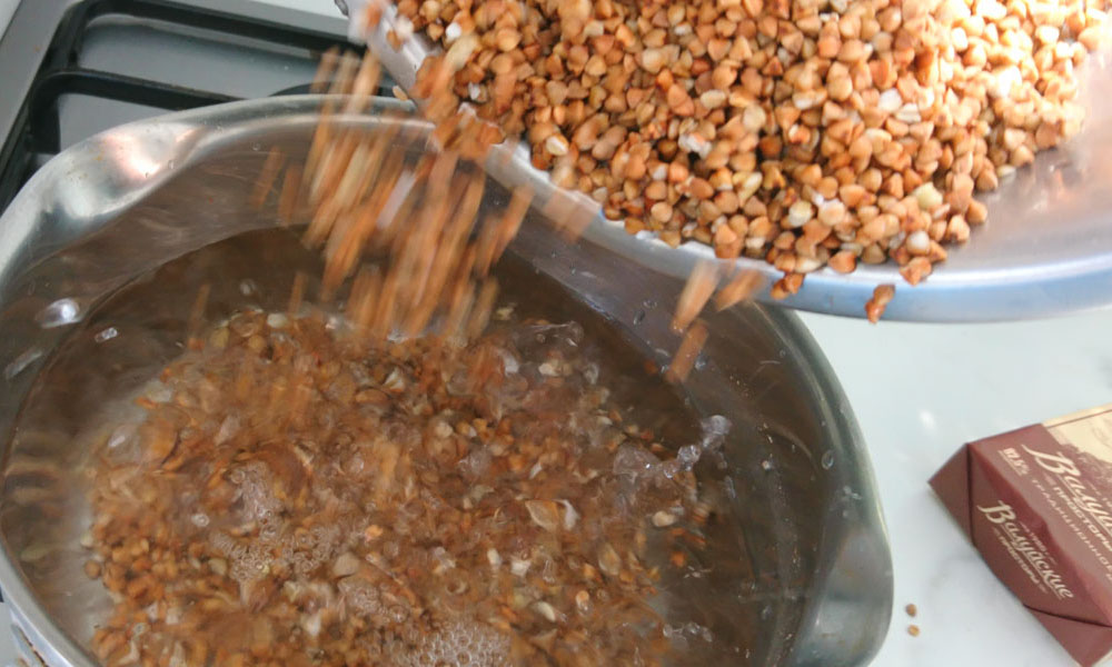 pour buckwheat into the pan