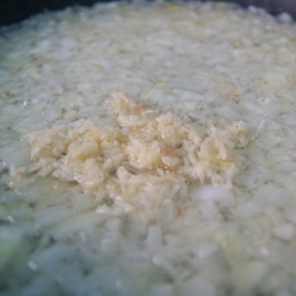 add chopped garlic to the pan