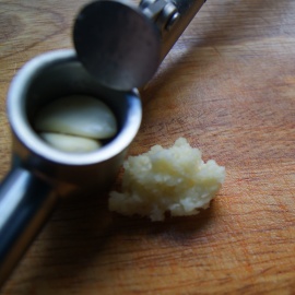finely chop the garlic for lecho