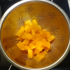 boiled pumpkin in a colander