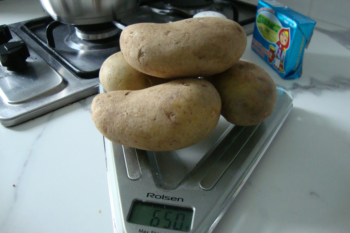 Unpeeled potatoes for cooking